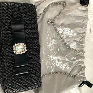 Brighten my flat in London clutch handbag woven leather